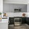 a kitchen with white cabinets